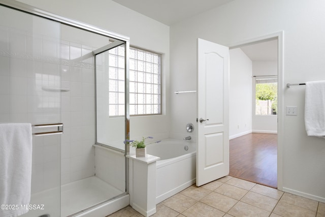 9438 N Weather Hill Dr, Tucson, AZ 85743 - bathroom with a stall shower, a garden tub, and tile patterned floors