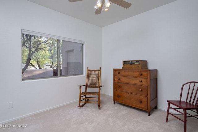 10380 E Rancho Del Este Dr, Tucson, AZ 85749 - living area featuring carpet and a ceiling fan