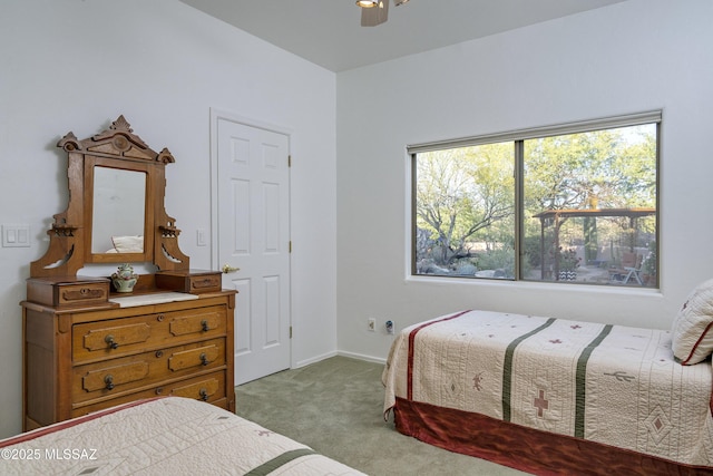 10380 E Rancho Del Este Dr, Tucson, AZ 85749 - bedroom featuring light colored carpet and a ceiling fan