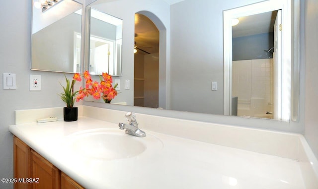 5553 W Carriage Dr, Tucson, AZ 85742 - bathroom with vanity and a ceiling fan