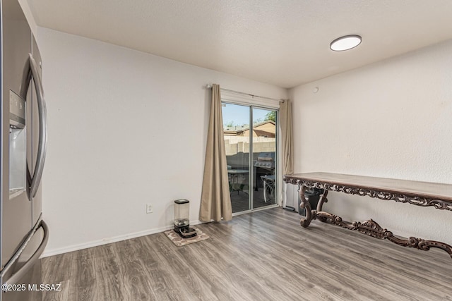 6293 S Sun View Way, Tucson, AZ 85706 - spare room featuring wood finished floors and baseboards