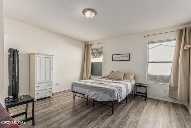 6293 S Sun View Way, Tucson, AZ 85706 - bedroom featuring wood finished floors and baseboards