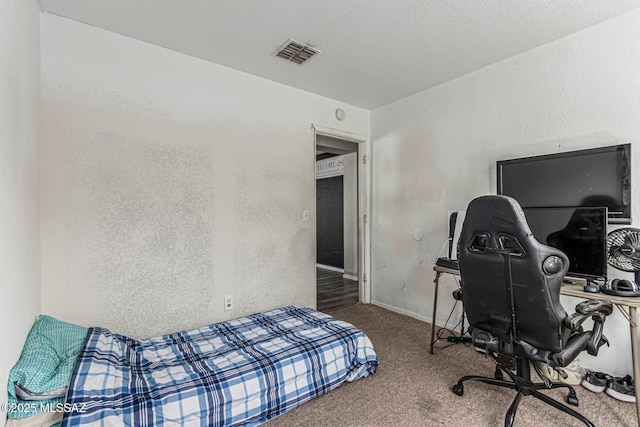 6293 S Sun View Way, Tucson, AZ 85706 - carpeted bedroom with a textured wall and a desk