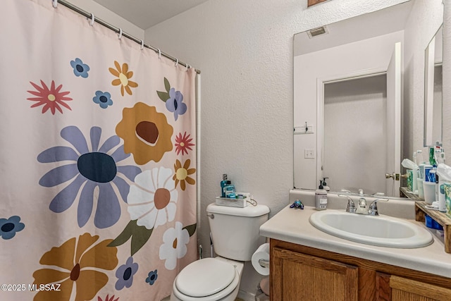 6293 S Sun View Way, Tucson, AZ 85706 - full bath featuring vanity, a textured wall, and a shower with shower curtain