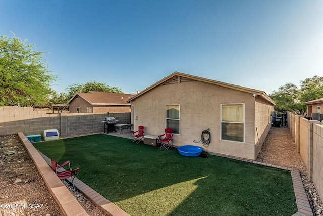 6293 S Sun View Way, Tucson, AZ 85706 - back of house featuring stucco siding and a fenced backyard