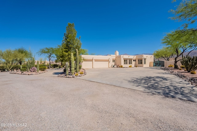 3655 N Harrison Rd, Tucson, AZ 85749 - southwest-style home with a garage, driveway, and stucco siding