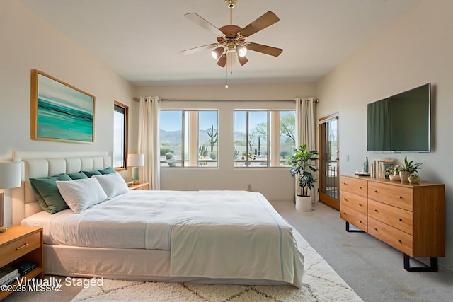 3655 N Harrison Rd, Tucson, AZ 85749 - bedroom featuring light carpet, a ceiling fan, and access to outside