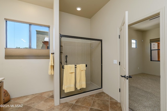 341 E Calderwood Rd, Tucson, AZ 85704 - full bath with a stall shower, vanity, and tile patterned floors