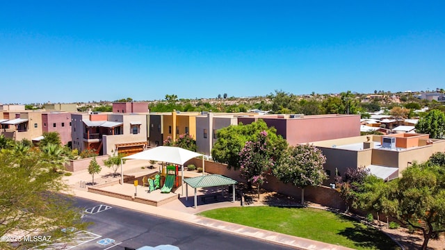 341 E Calderwood Rd, Tucson, AZ 85704 - view of building exterior with a residential view