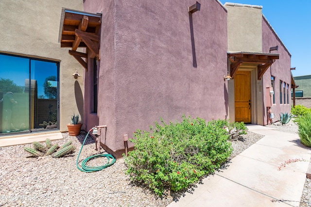 341 E Calderwood Rd, Tucson, AZ 85704 - view of home's exterior with stucco siding