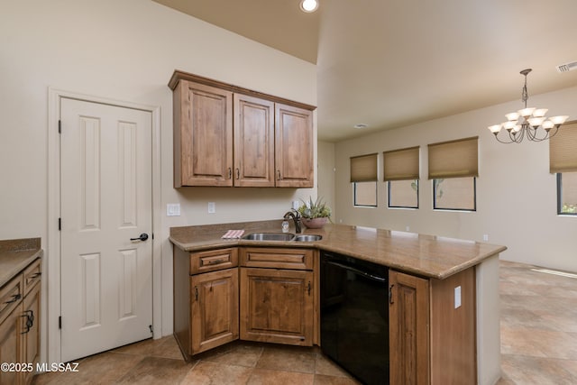 341 E Calderwood Rd, Tucson, AZ 85704 - kitchen with black dishwasher, a peninsula, a chandelier, pendant lighting, and brown cabinetry
