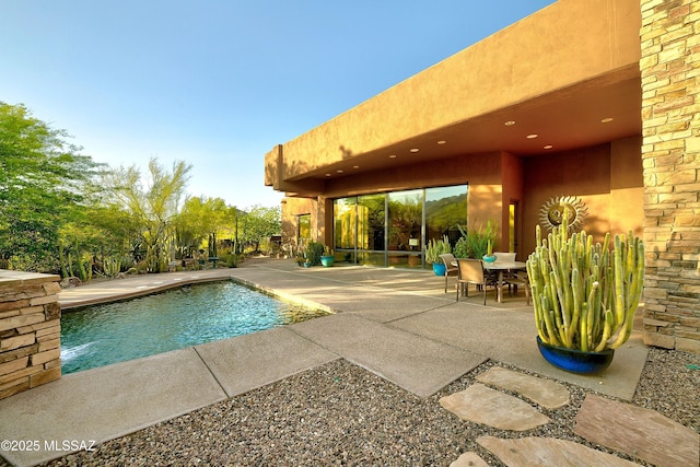 5254 W Saguaro Cliffs Dr, Tucson, AZ 85745 - outdoor pool with a patio and outdoor dining area