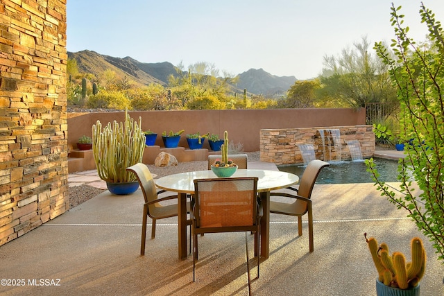 5254 W Saguaro Cliffs Dr, Tucson, AZ 85745 - view of patio with a mountain view and outdoor dining space