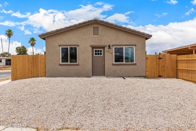 3710 S Bellingham Pl, Tucson, AZ 85730 - rear view of house featuring a gate and stucco siding