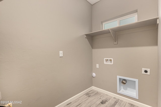3710 S Bellingham Pl, Tucson, AZ 85730 - laundry room featuring washer hookup, light wood-type flooring, and hookup for an electric dryer