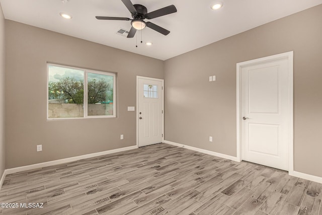 3710 S Bellingham Pl, Tucson, AZ 85730 - empty room with light wood-type flooring, ceiling fan, and recessed lighting