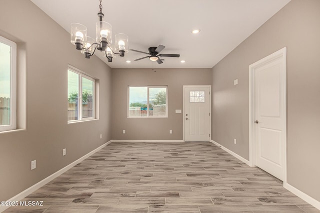 3710 S Bellingham Pl, Tucson, AZ 85730 - entryway featuring recessed lighting, a chandelier, a ceiling fan, and light wood-style floors