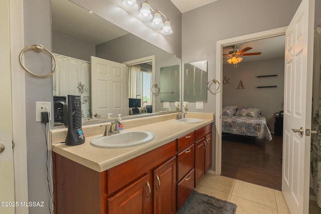 14199 N Bronze Statue Ave, Marana, AZ 85658 - full bathroom with ceiling fan, tile patterned flooring, ensuite bath, and double vanity
