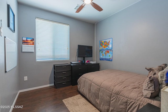 14199 N Bronze Statue Ave, Marana, AZ 85658 - bedroom with dark wood-style floors and ceiling fan