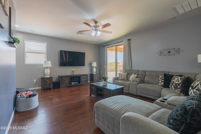 14199 N Bronze Statue Ave, Marana, AZ 85658 - living area featuring healthy amount of natural light, wood-type flooring, and a ceiling fan