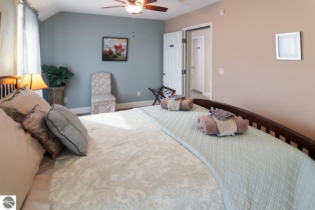 bedroom with ceiling fan and lofted ceiling