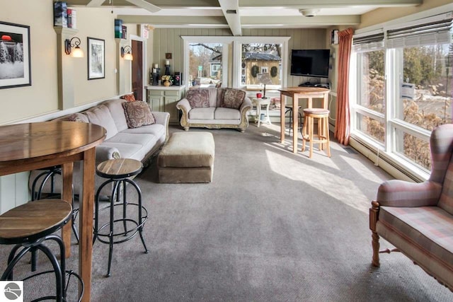 carpeted living room with coffered ceiling and beam ceiling