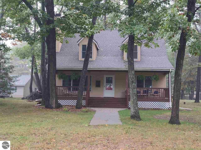 view of front of property with a front lawn and a porch