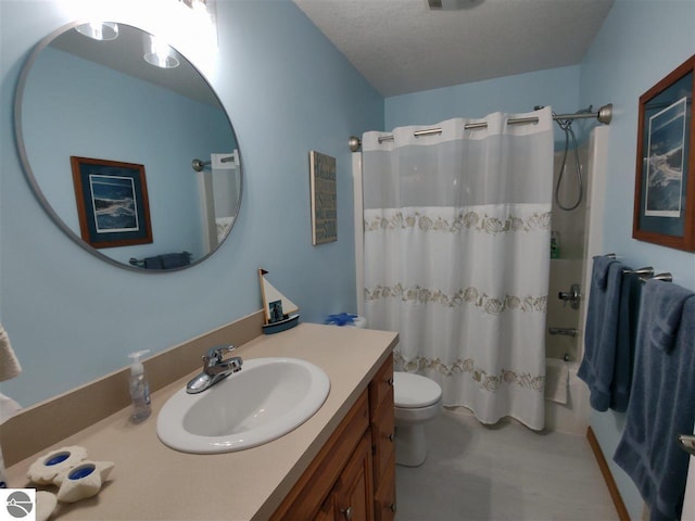 full bathroom featuring vanity, shower / bathtub combination with curtain, a textured ceiling, and toilet