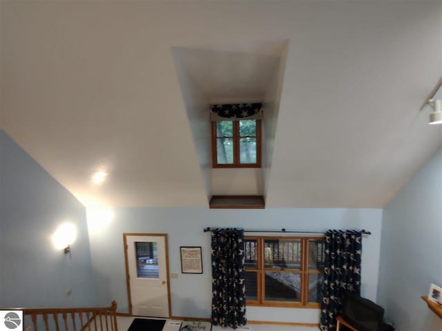 interior space featuring vaulted ceiling