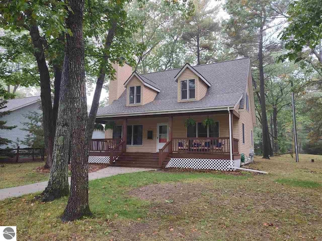 view of front facade with a porch and a front yard