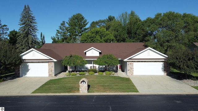 single story home with a front lawn and a garage