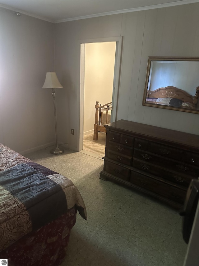 bedroom featuring carpet and ornamental molding