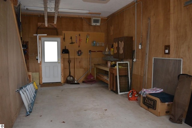 garage with wood walls