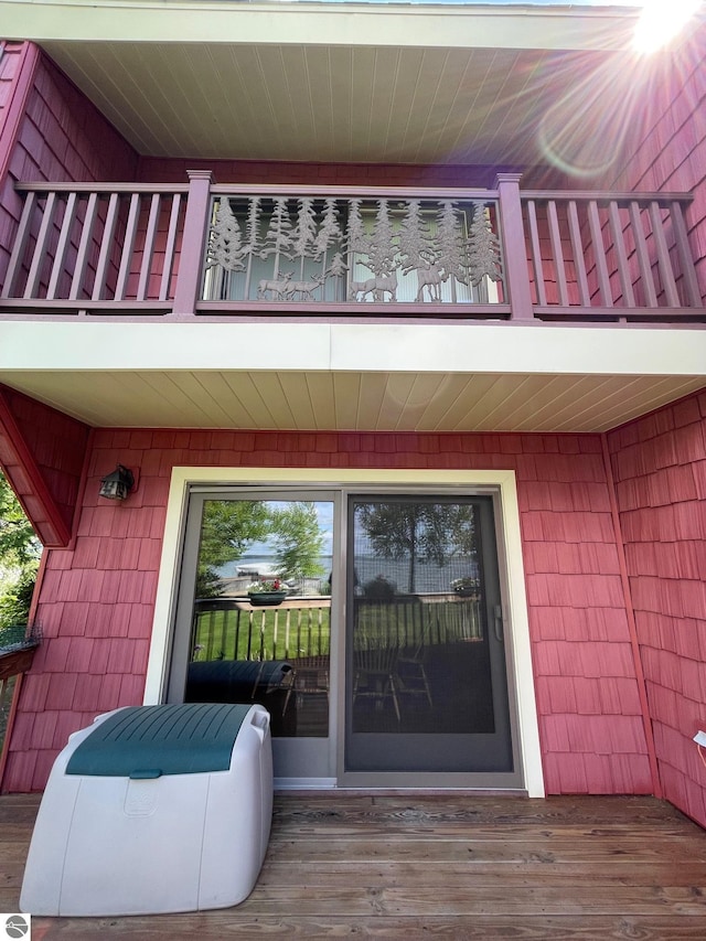 property entrance with a balcony