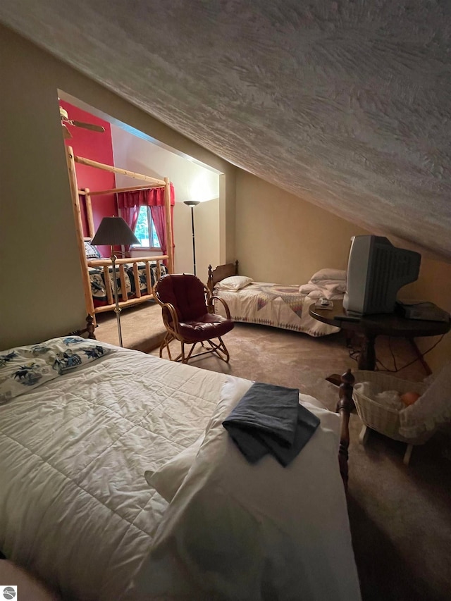 carpeted bedroom with a textured ceiling