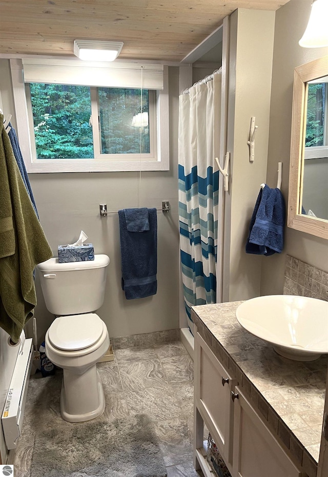 bathroom featuring baseboard heating, tile flooring, toilet, vanity, and wood ceiling