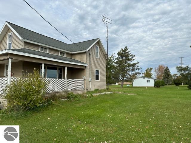 view of property exterior featuring a yard