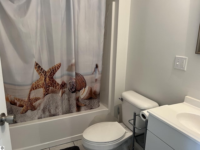 full bathroom featuring tile patterned flooring, shower / tub combo, vanity, and toilet