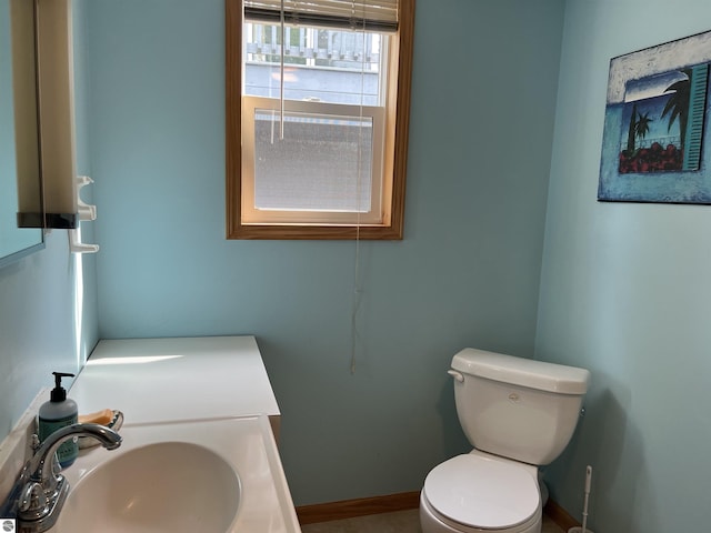 bathroom with sink and toilet