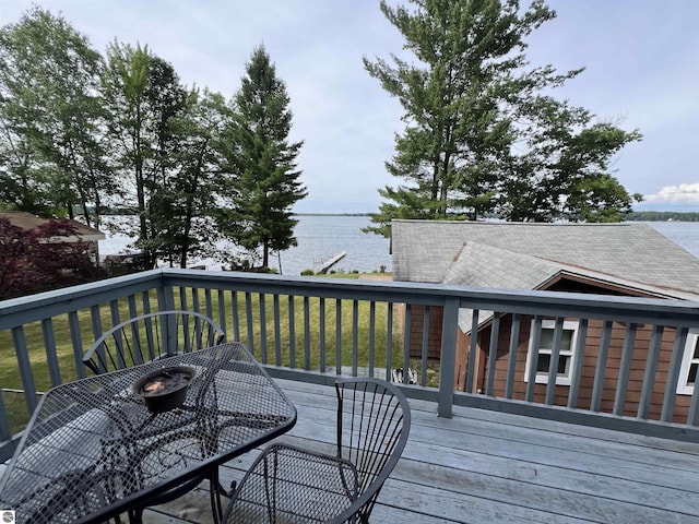 wooden deck with a water view