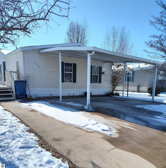 manufactured / mobile home with a carport