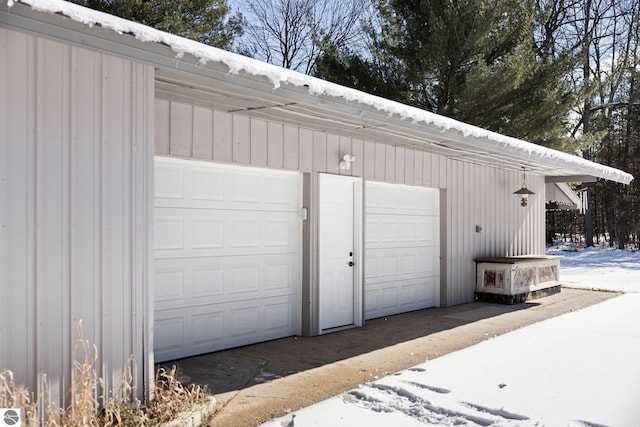 view of snow covered garage