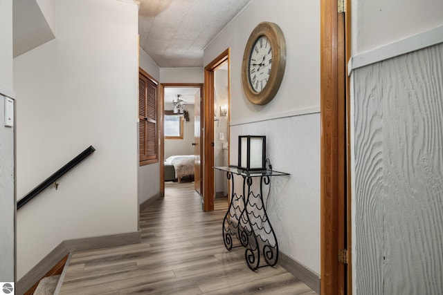 corridor featuring hardwood / wood-style floors