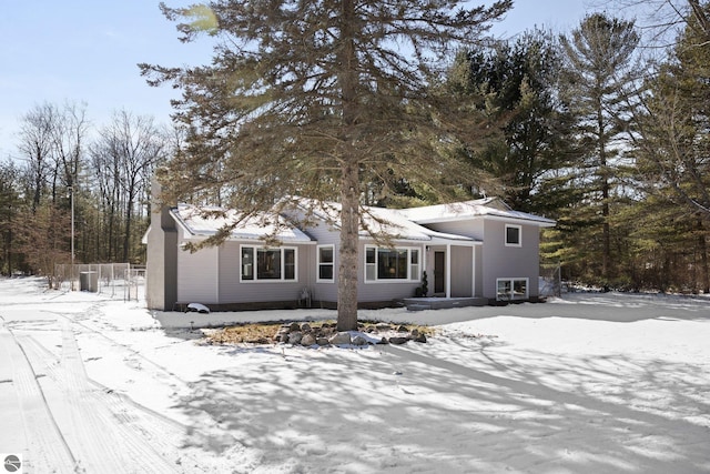 view of front of home with central air condition unit