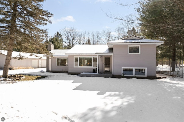 view of snow covered property