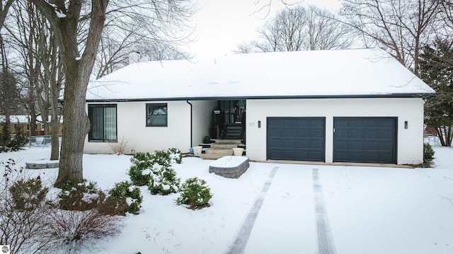 single story home with a garage