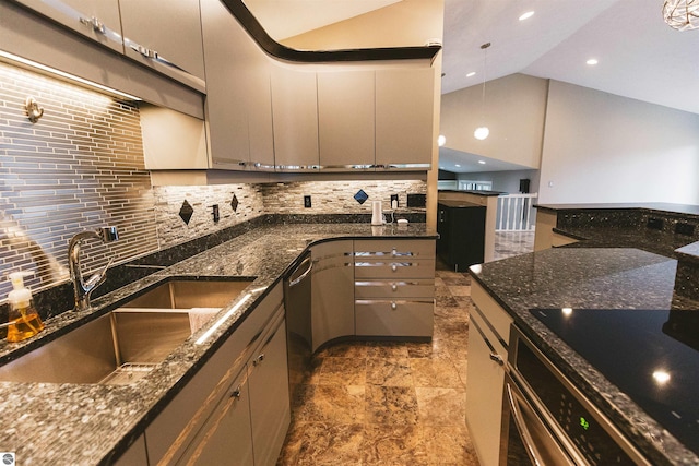 kitchen with gray cabinetry, sink, tasteful backsplash, pendant lighting, and dark stone counters