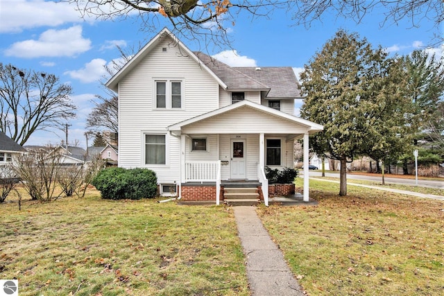 view of front of home featuring a front lawn and a porch