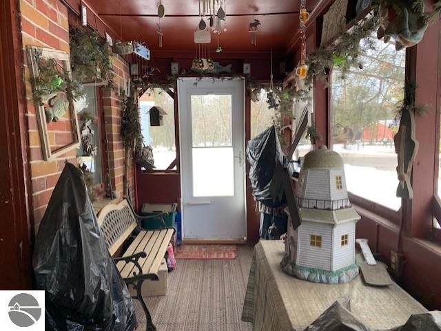 sunroom / solarium with a wealth of natural light