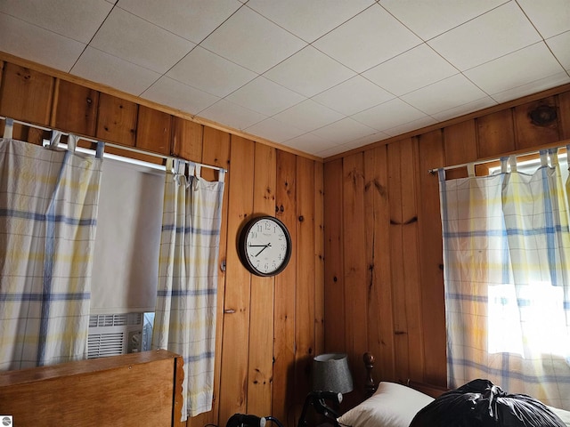 5934 Chippewa Trl, Hale, MI 48739 - unfurnished bedroom featuring wooden walls and cooling unit